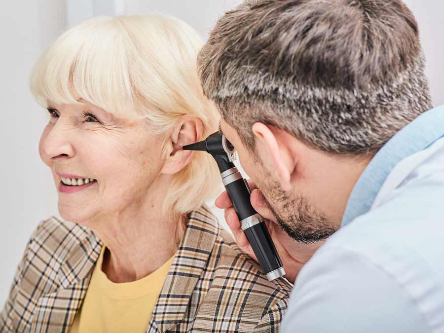 A free hearing health check up taking place at a local Peninsula Hearing Care practice in Devon & Cornwall