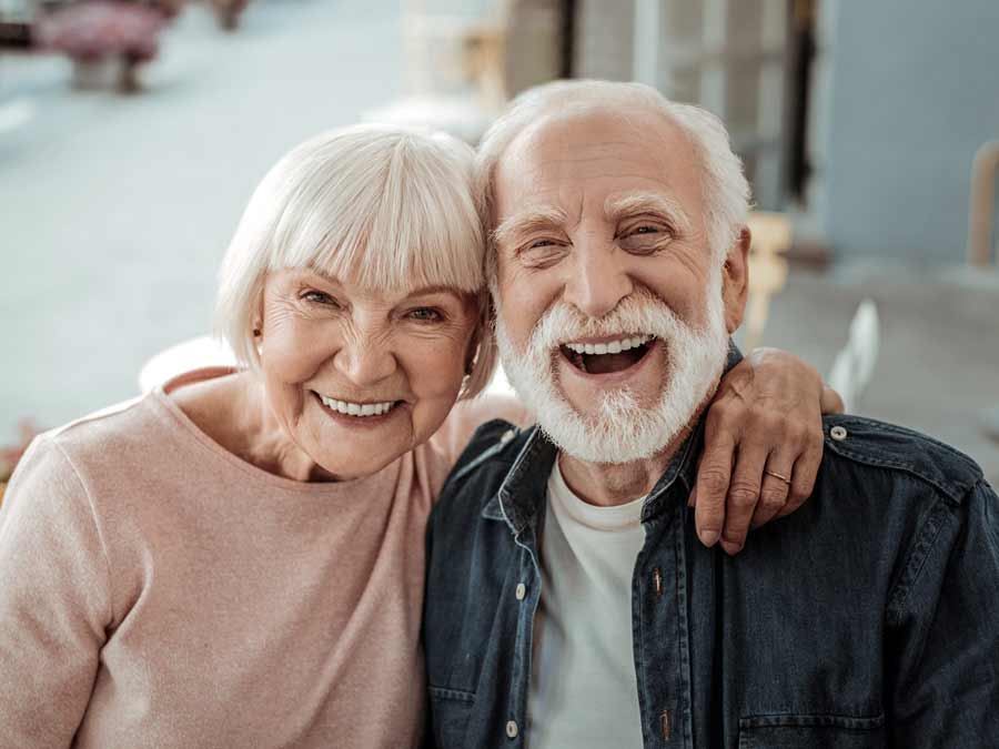 A happy couple having received independent, unbiased hearing care and advice at Peninsula Hearing Care in Devon and Cornwall.
